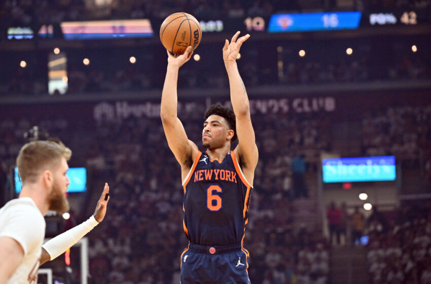 CLEVELAND, OHIO - APRIL 15: Quentin Grimes #6 of the New York Knicks shoots over Dean Wade #32 of the Cleveland Cavaliers during the first quarter of Game One of the Eastern Conference First Round Playoffs at Rocket Mortgage Fieldhouse on April 15, 2023 in Cleveland, Ohio. NOTE TO USER: User expressly acknowledges and agrees that, by downloading and or using this photograph, User is consenting to the terms and conditions of the Getty Images License Agreement. (Photo by Jason Miller/Getty Images)